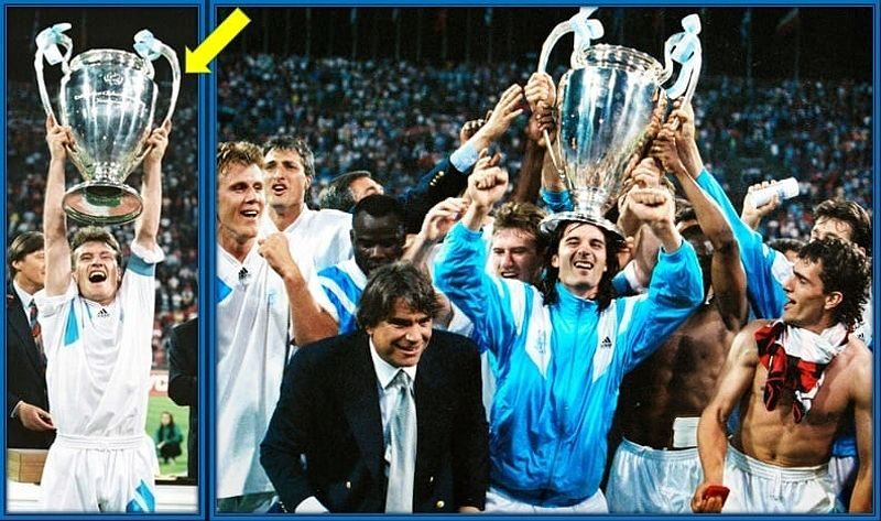 Didier Deschamps nâng cao chiếc cúp UEFA Champions League trong màu áo Marseille.